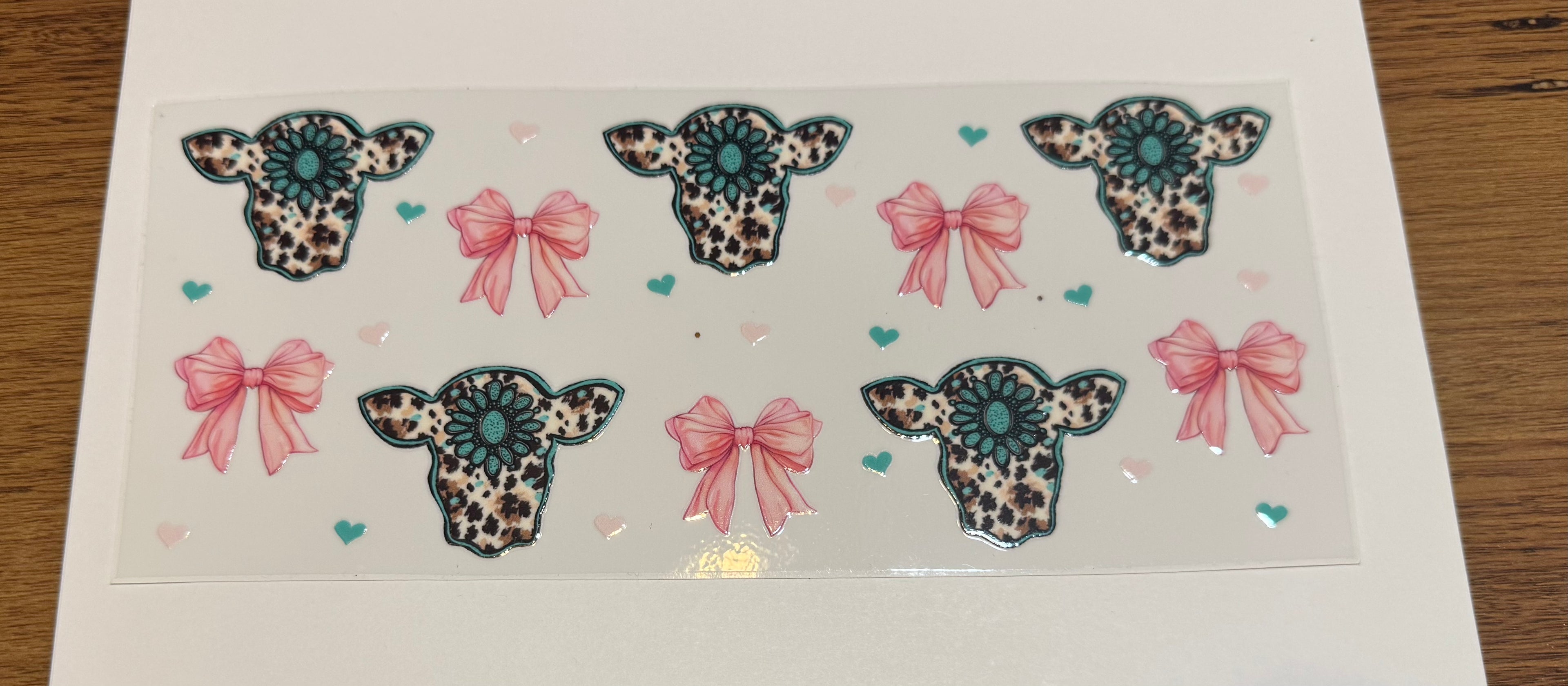 Turquoise Cow and bows